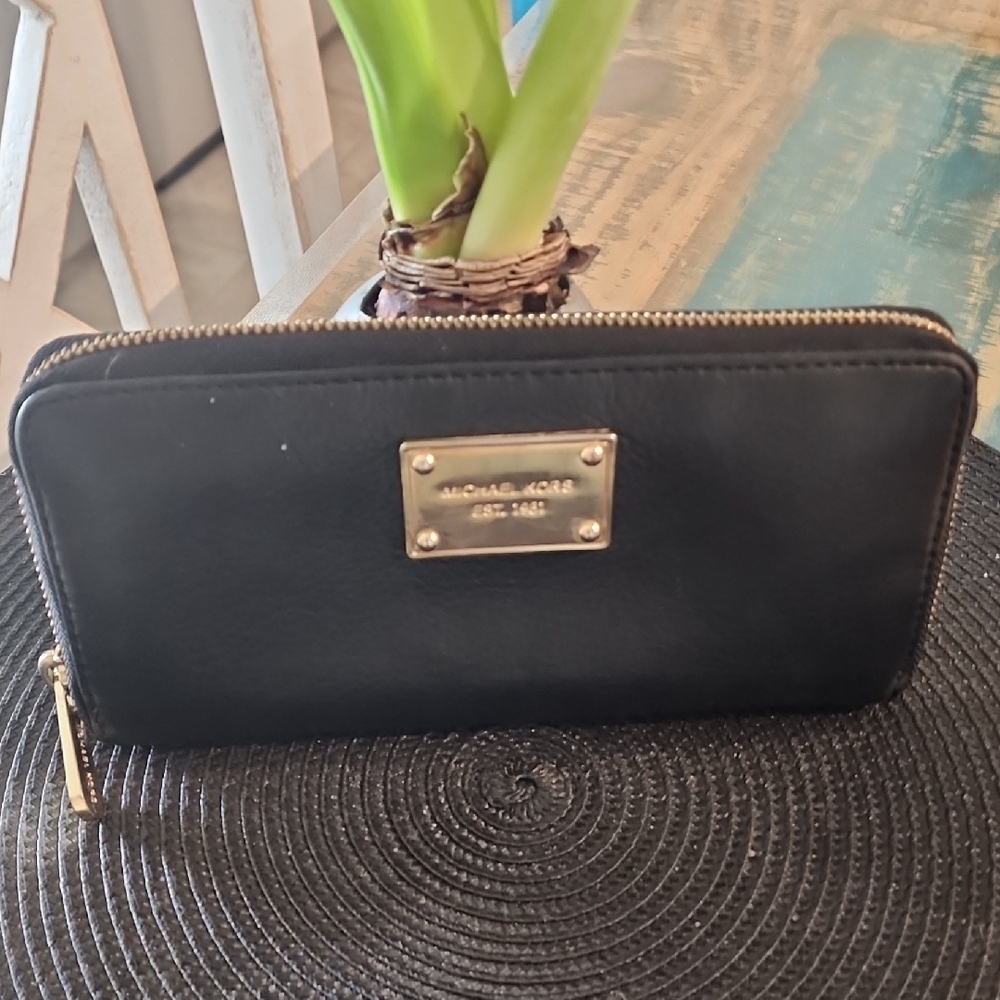 - Michael Kors Black Wallet with Gold Hardware and Smooth Leather